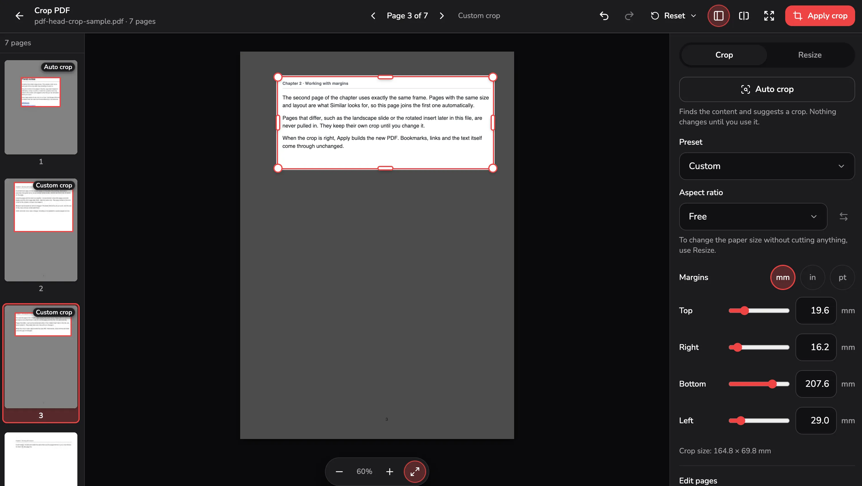 PDF Head's crop editor with a book page of the seven-page sample cropped around its text, a handle on every corner and edge, and margins in mm, ready to apply the crop.